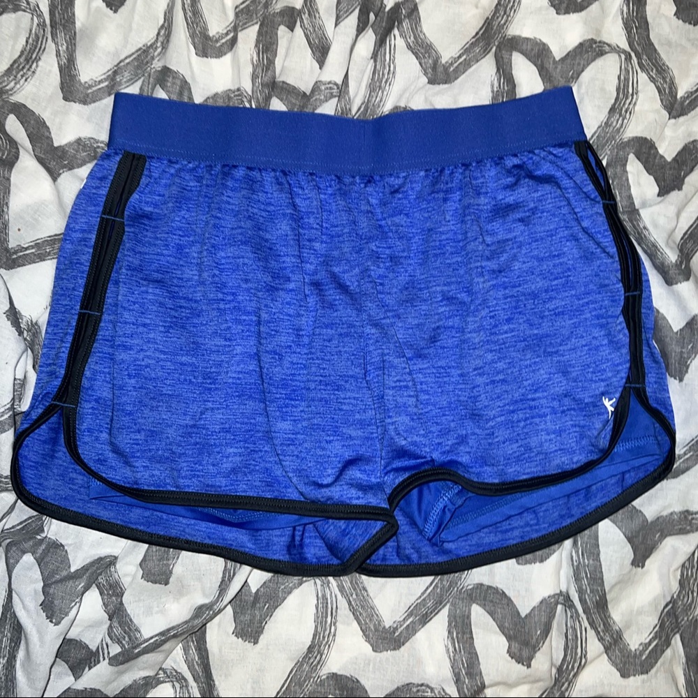Women’s Danskin Now semi-fitted blue running shorts size Medium